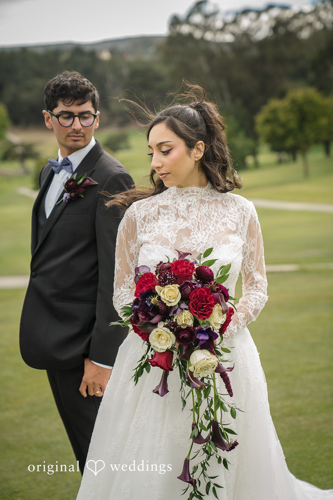Janelle + Yaser Bride and groom posing for photography at Green Hills Country Club