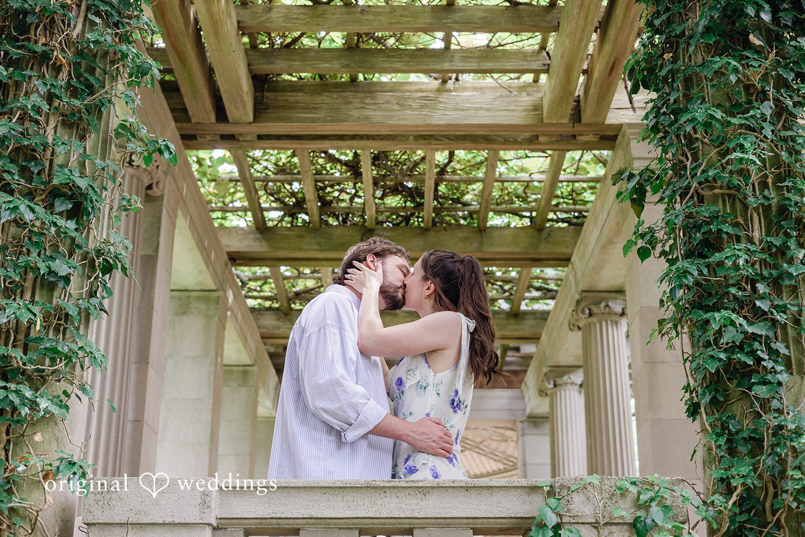 Couple sharing a romantic kiss at Harkness Park