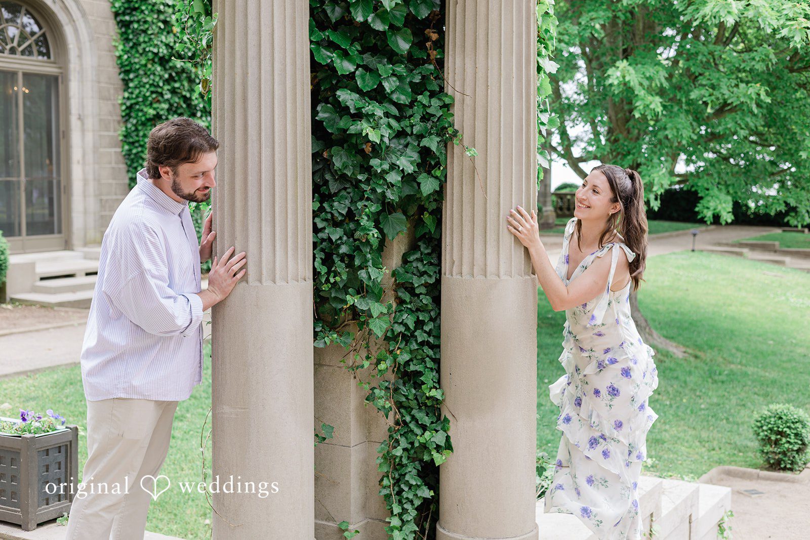 Couple standing and looking at each other with a smile at Harkness Park
