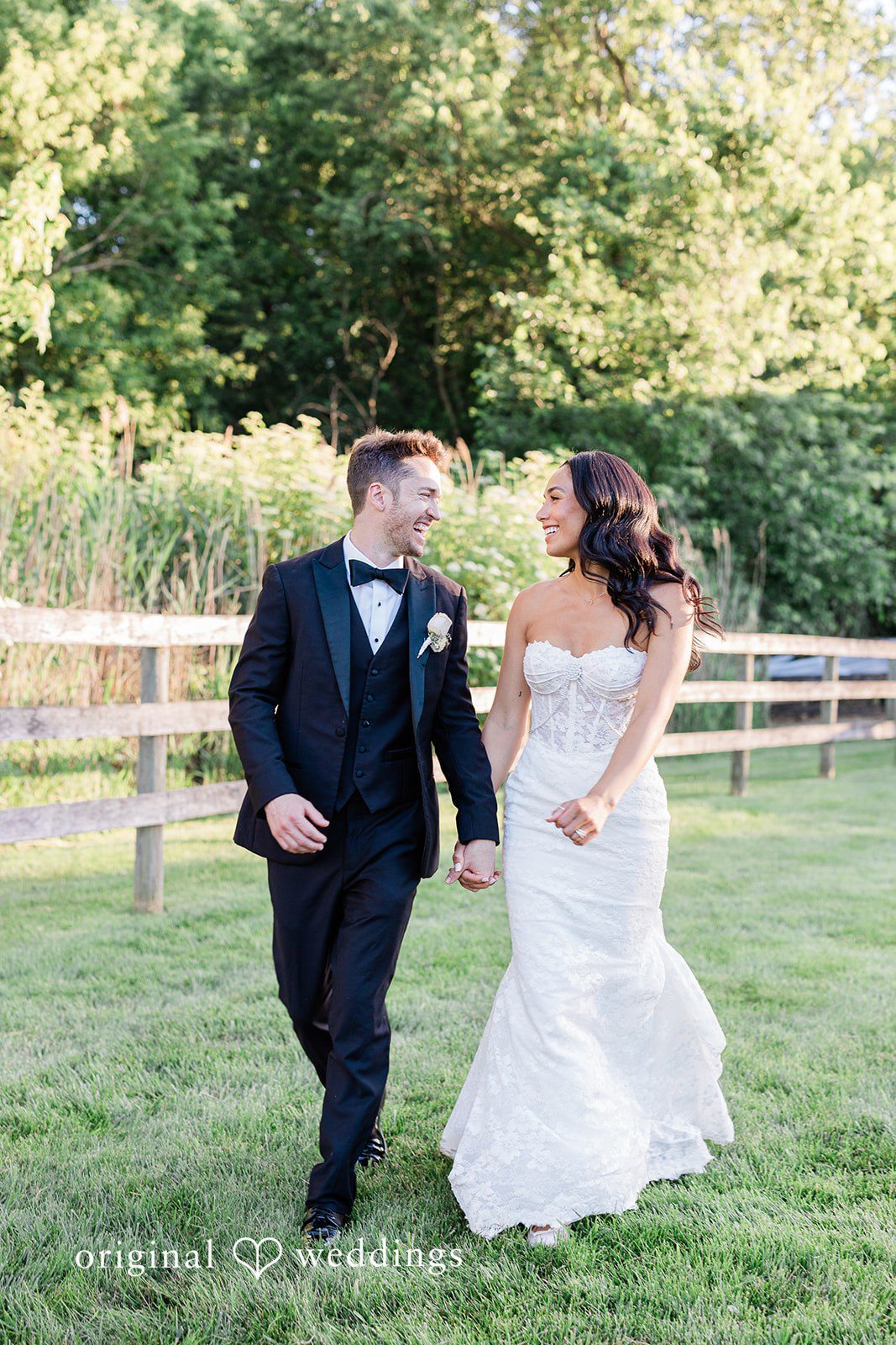 Couple walking while looking at each other at Chicago Backyard