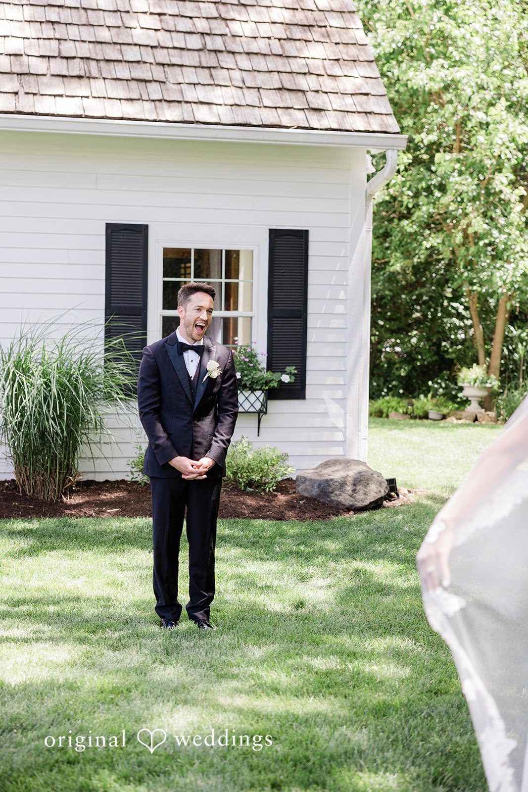 Stunning picture of  groom while smiling at Chicago Backyard