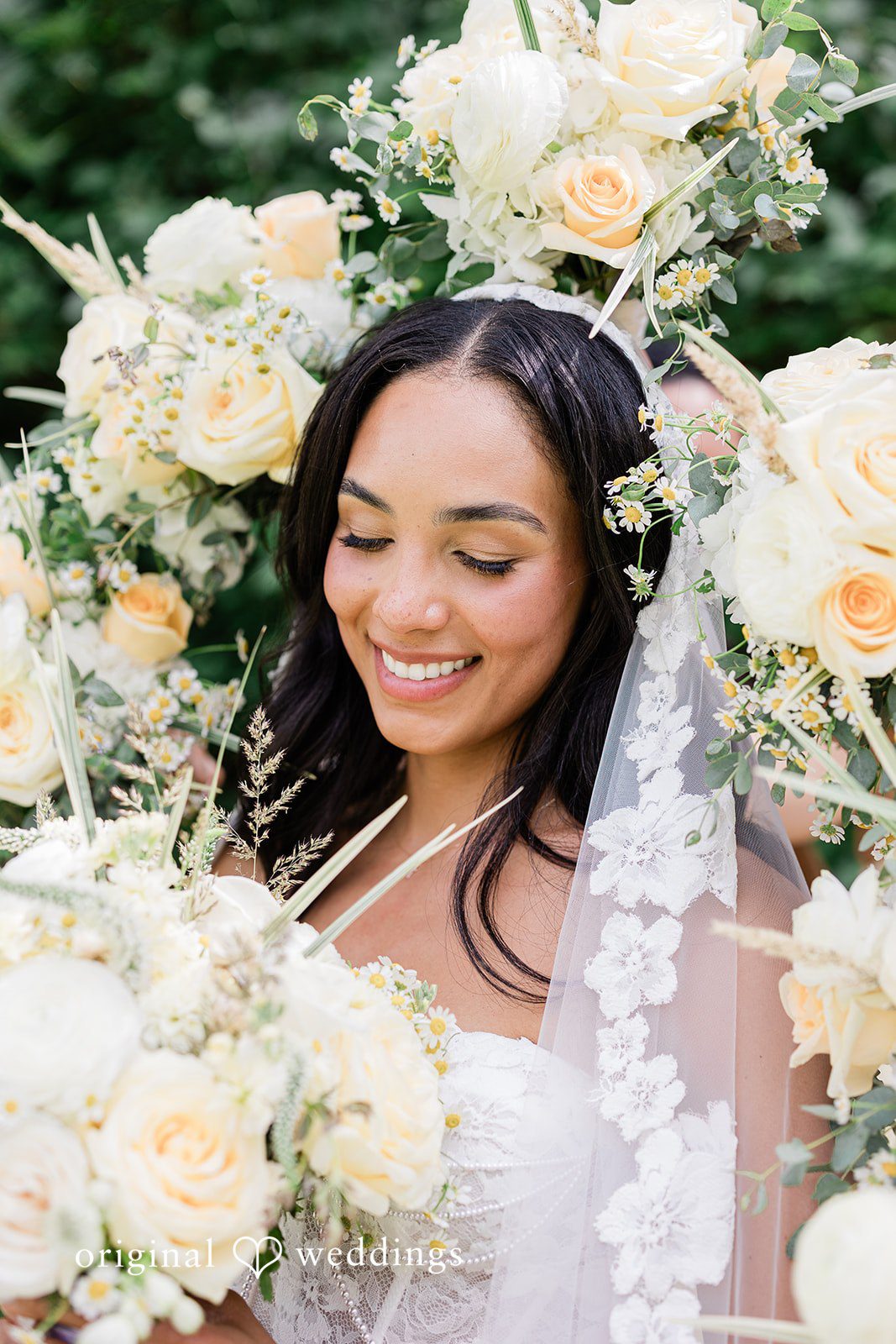 Bride smiling among blooming flowers at Chicago Backyard