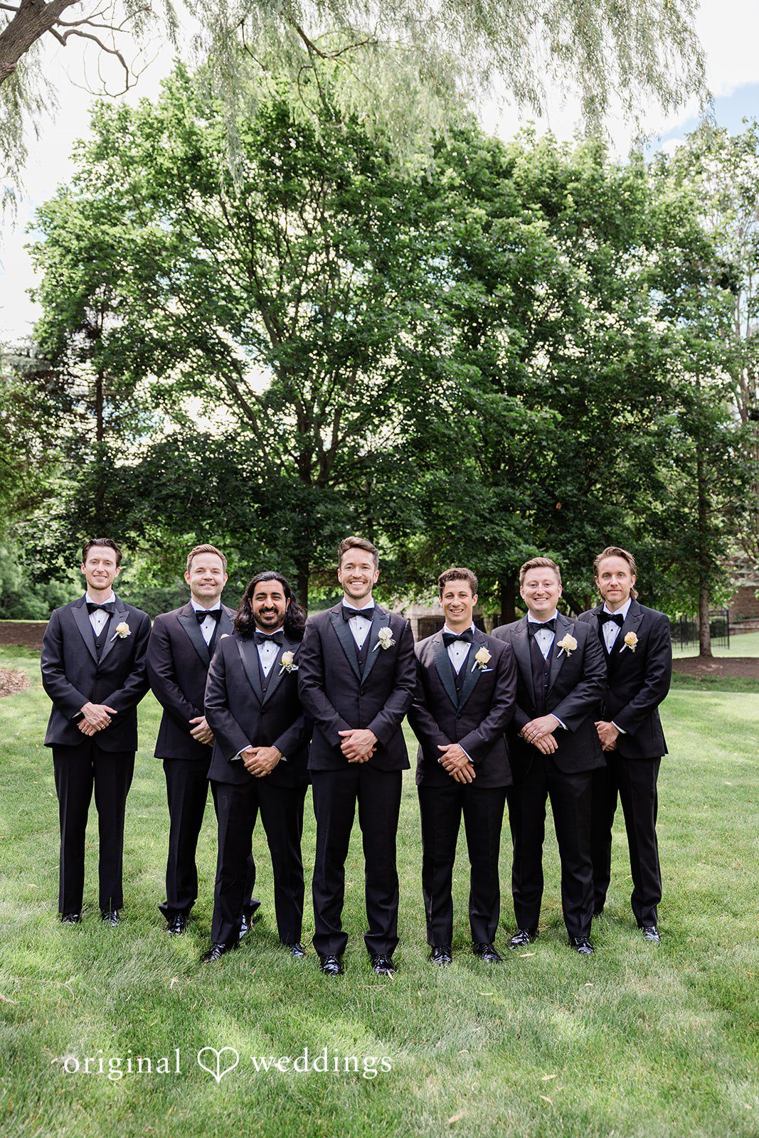 Groom smiling with groomsmen before the ceremony at Chicago Backyard