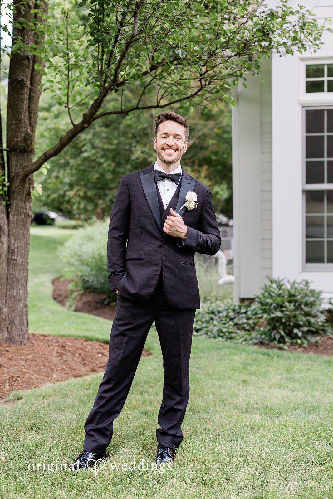 Groom smiling in a solo portrait at Chicago Backyard