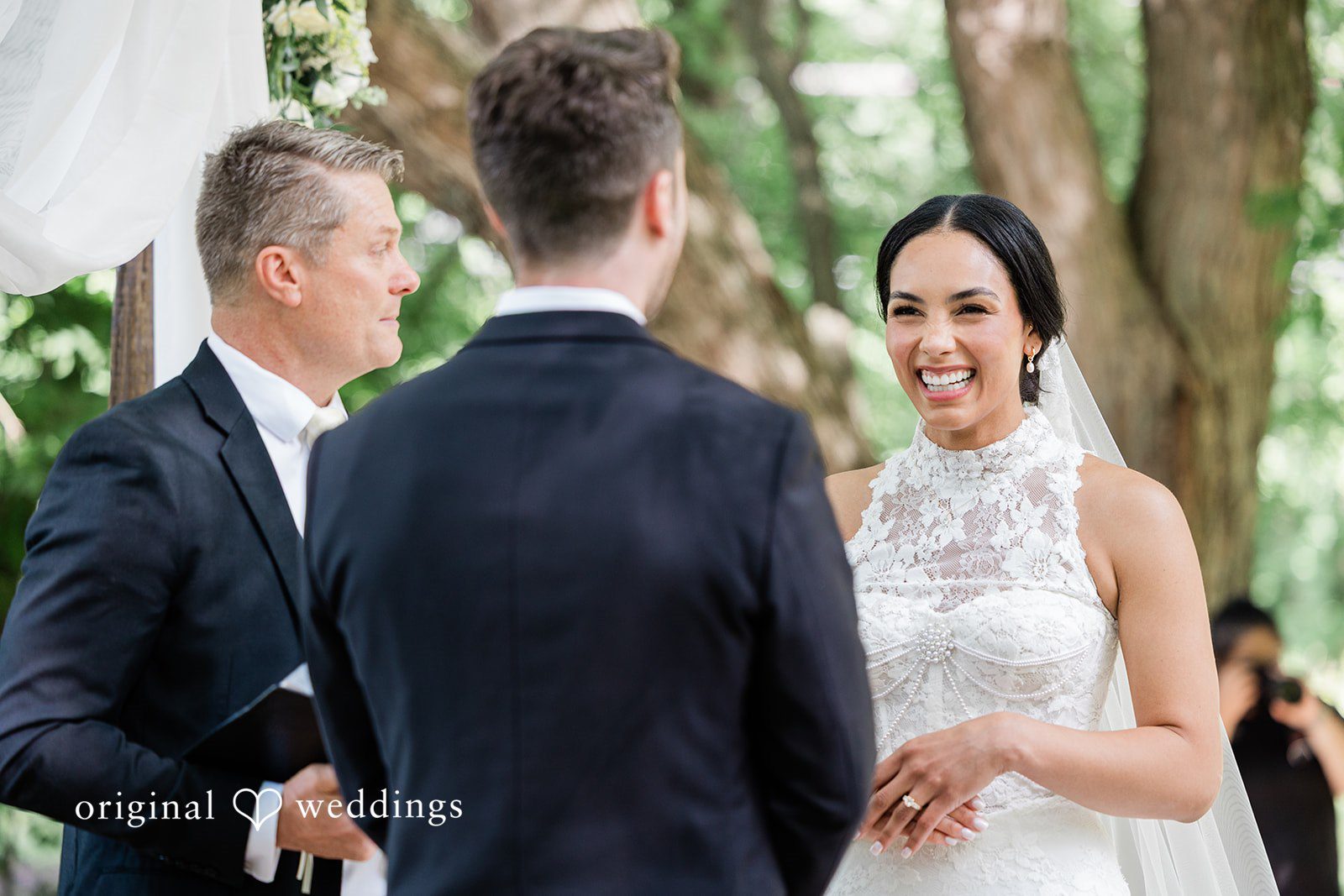 Bride smiling while looking at each other at Chicago Backyard