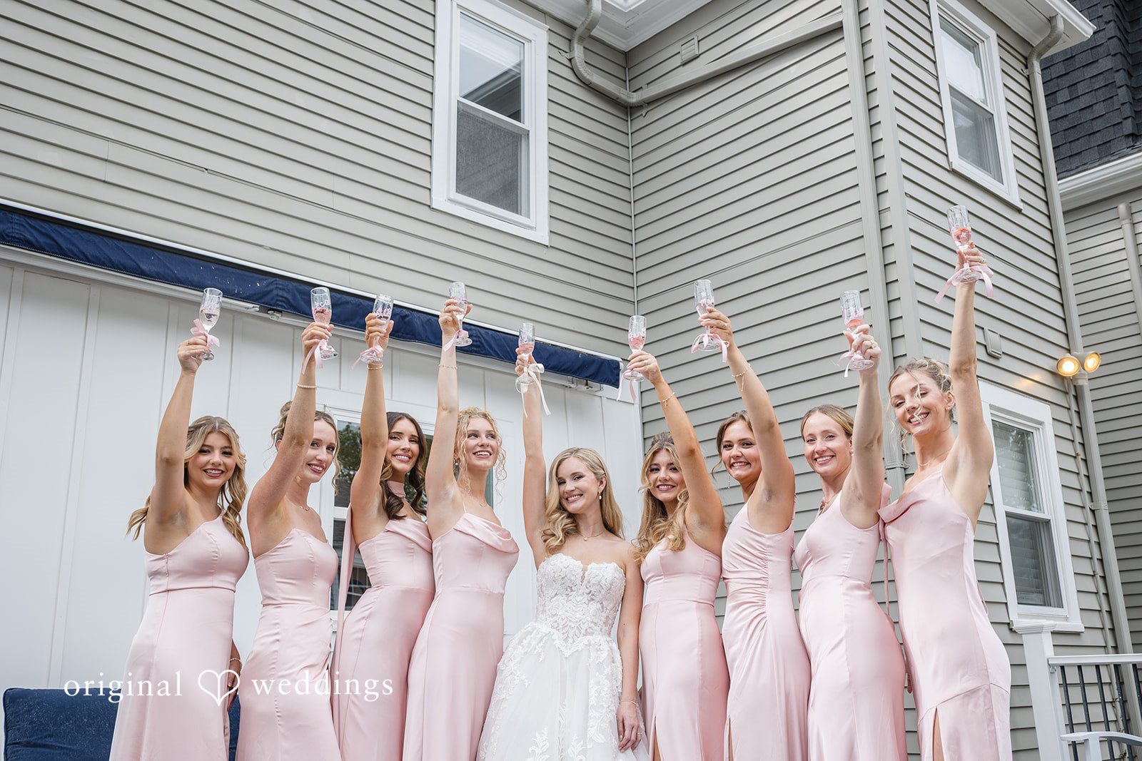 Emily + Jacob The bride and her bridesmaids share a toast