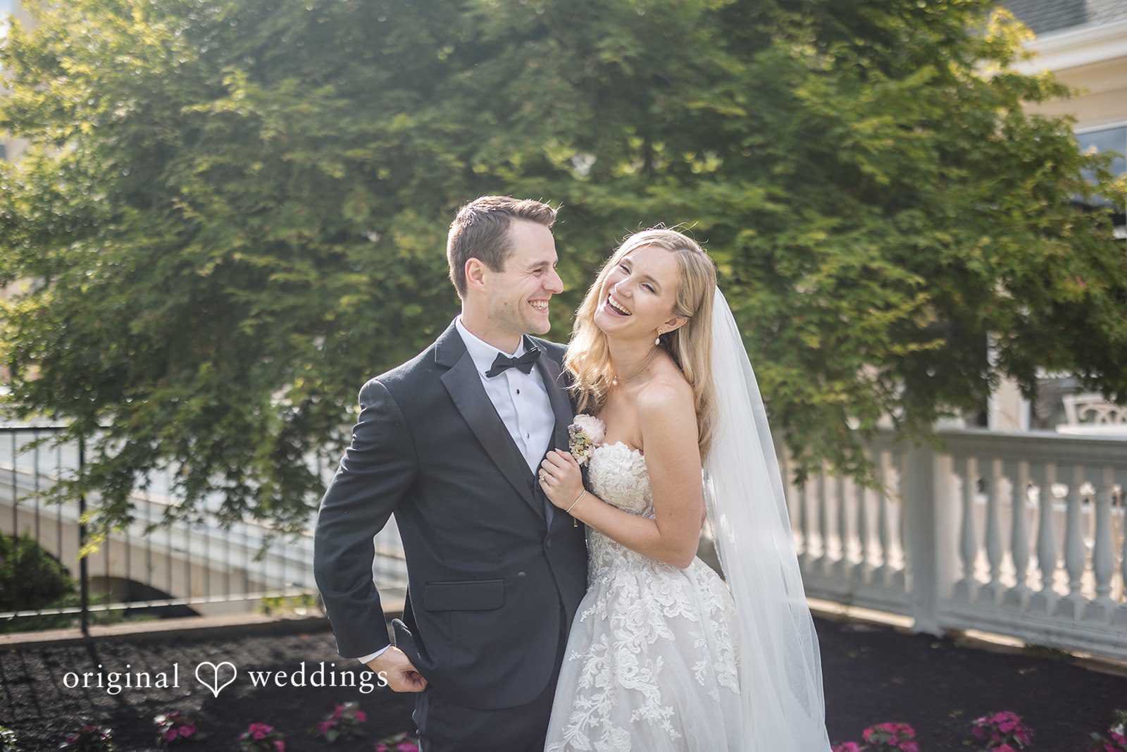 Emily + Jacob Our Boston wedding photographers captured a stunning portrait of the couple at the Indian Pond Country Club