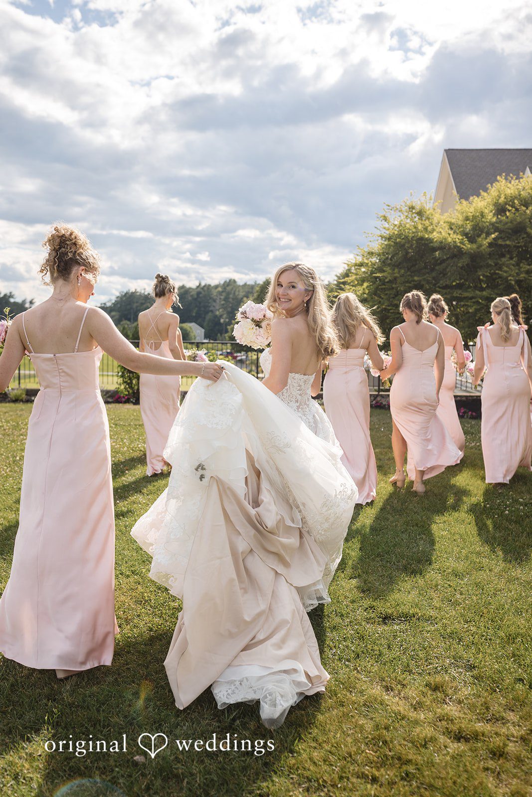 Emily + Jacob A stylish portrait of the bride and her bridesmaids