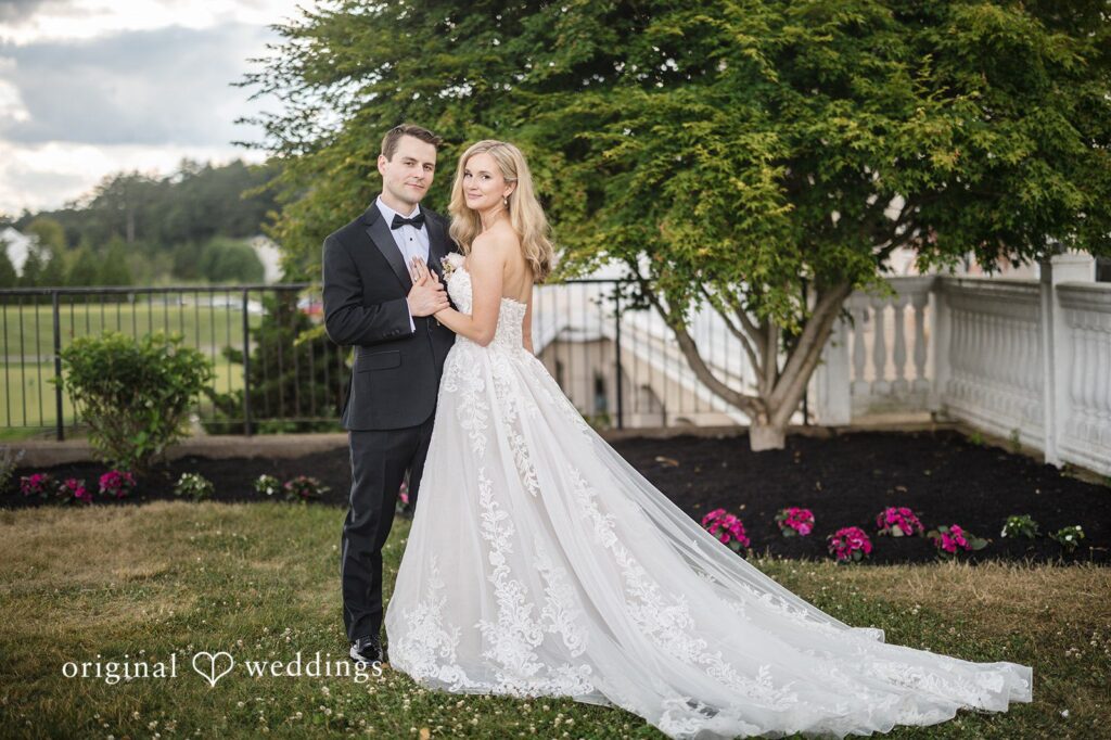 Emily + Jacob Our Boston wedding photographers at Original Weddings captured a stunning portrait of the couple at the Indian Pond Country Club