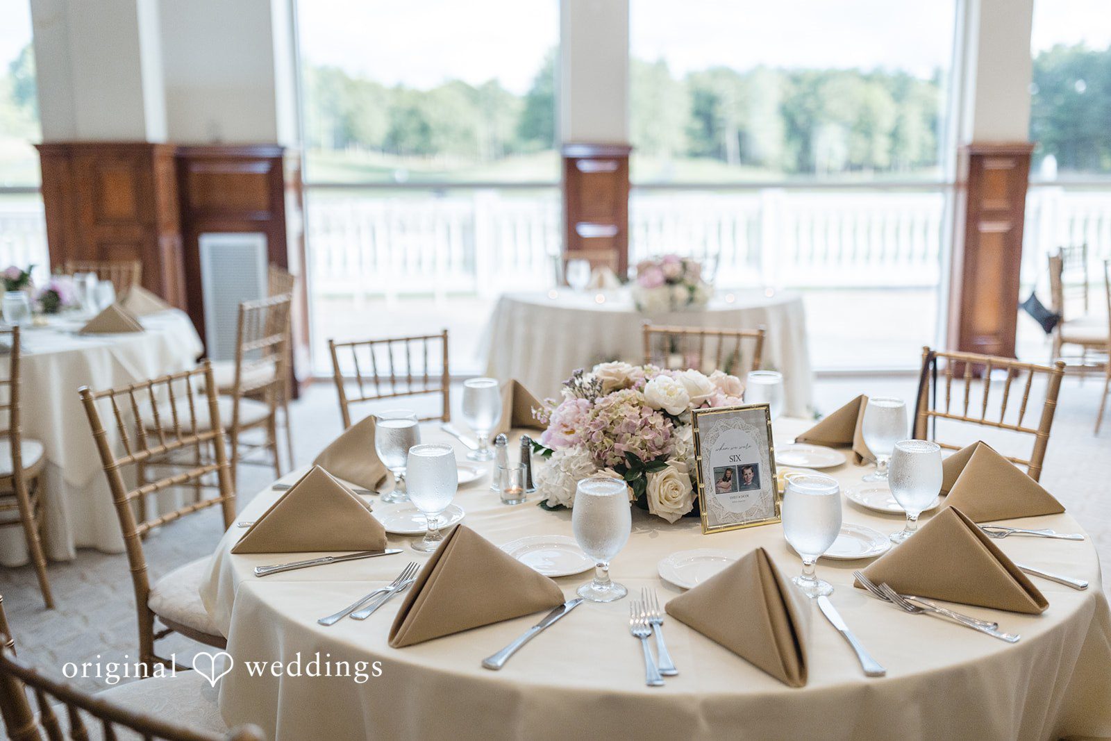 Emily + Jacob Decorated tables at the wedding reception hall