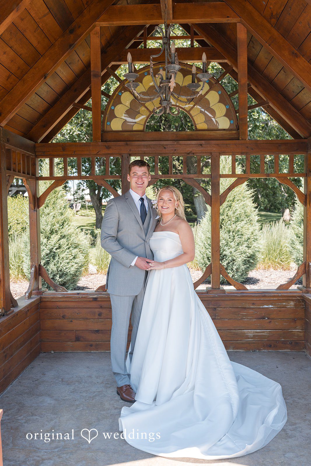 Cassandra + Adam Stunning Portrait of couple at Little Log House Pioneer Village by Minneapolis Wedding Photographers from Original Weddings.