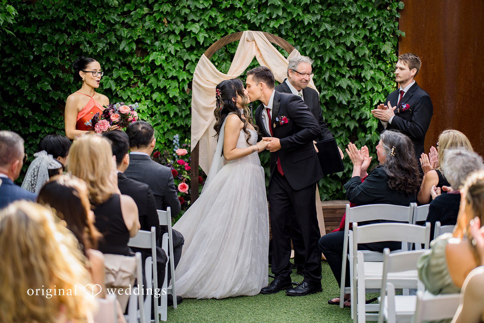 Bride and groom sharing a kiss at Lytle House