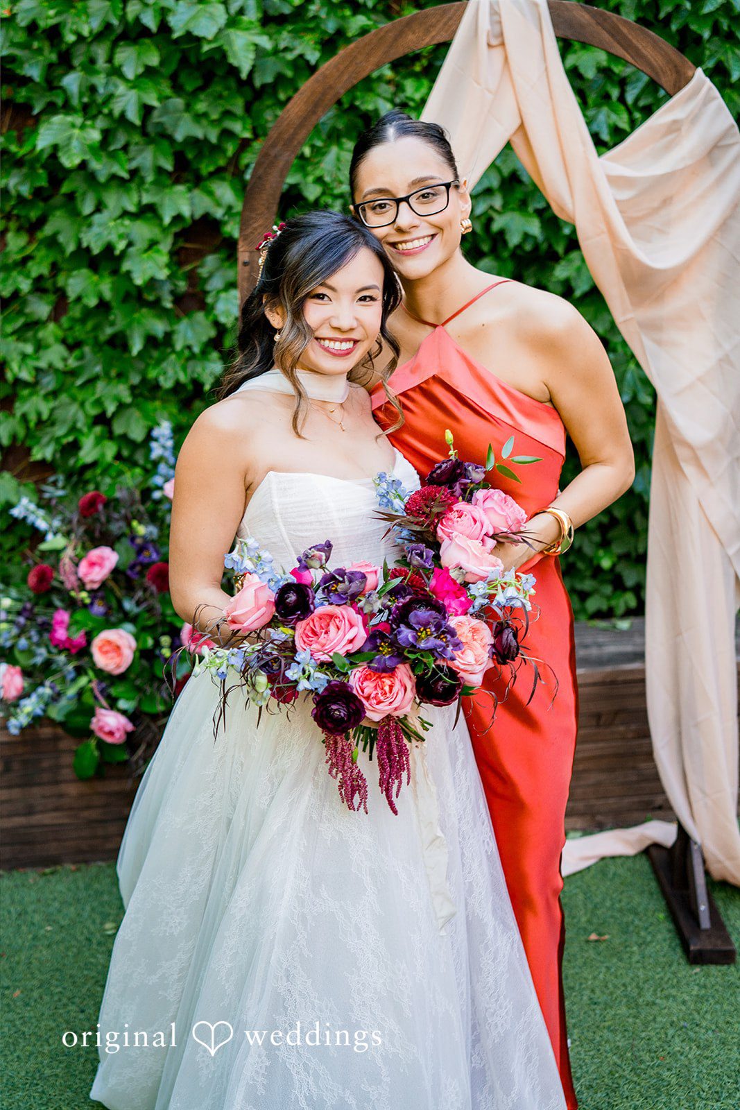 Lovely picture of  bride with her  friend before the ceremony at Lytle House