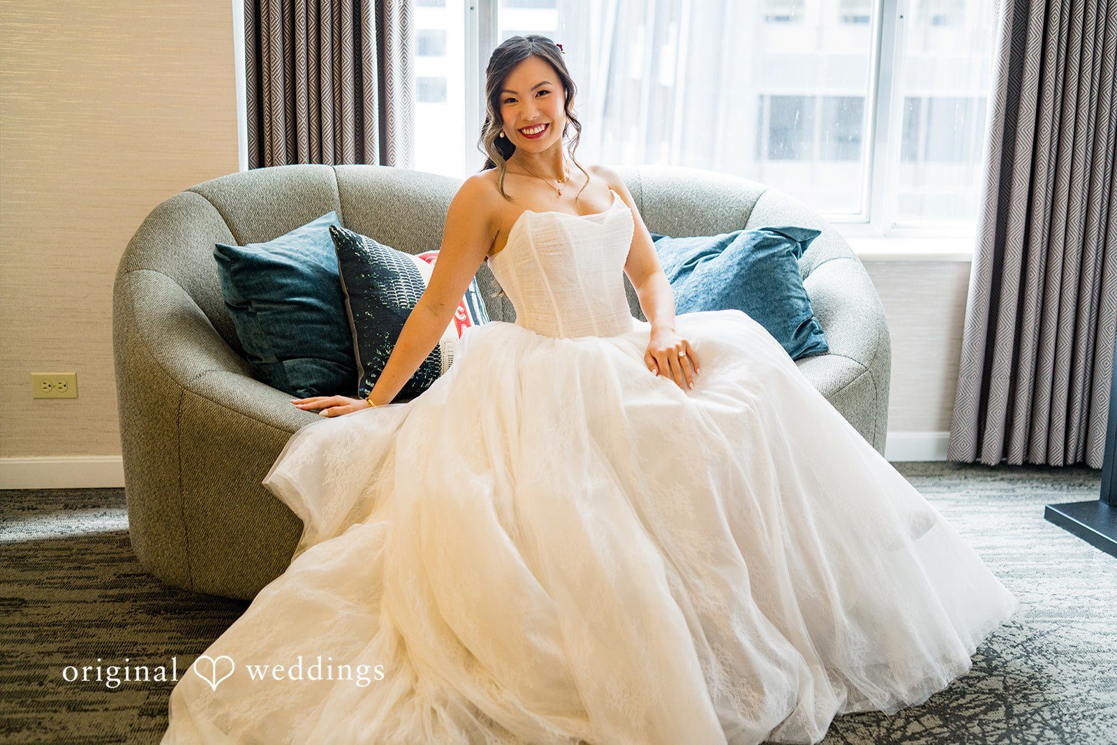 Bride sitting on a sofa at Lytle House