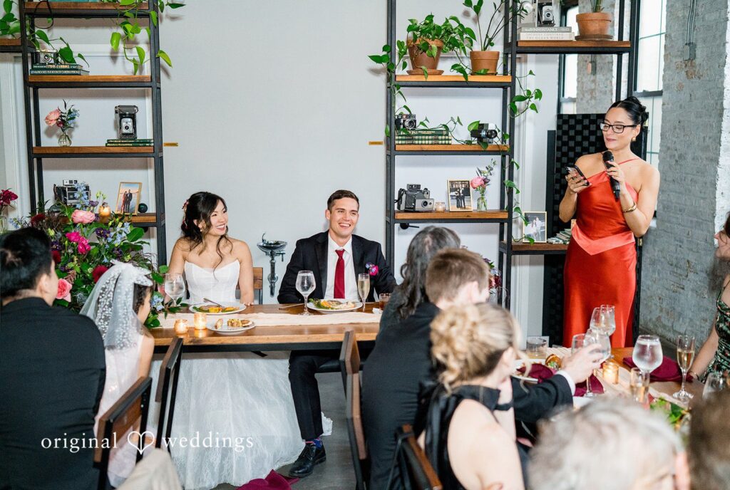 Chicago Wedding Photographers capturing couple seated at the reception table at Lytle House by Original Weddings