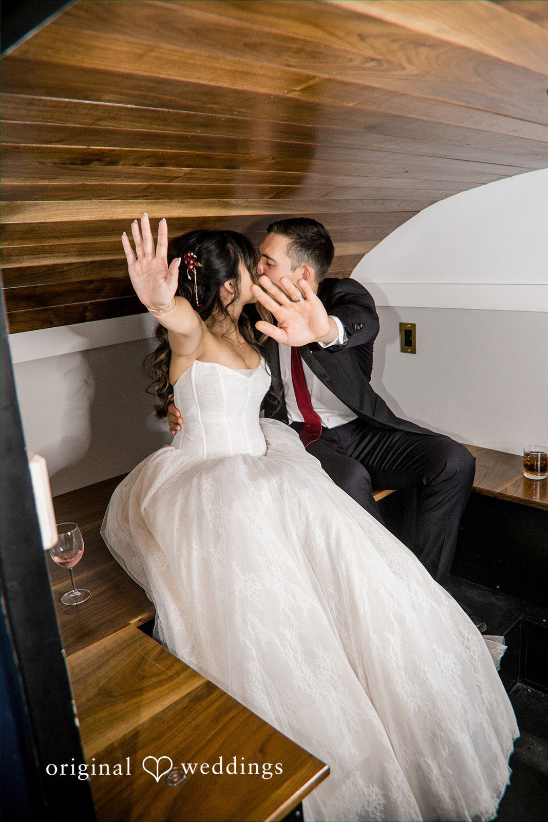 Chicago Wedding Photographers capturing couple kissing in a romantic way  at Lytle House by Original Weddings