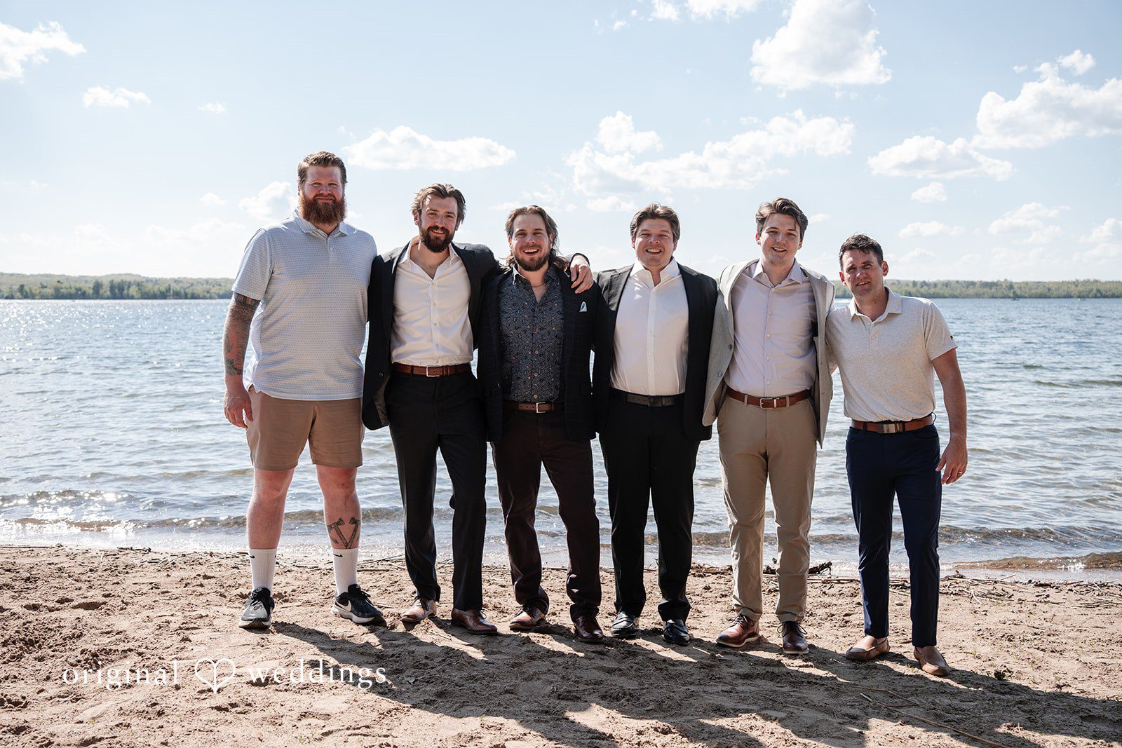 Annie + Andrew Group photo of groom with groomsmen at Madden's On Gull Lake