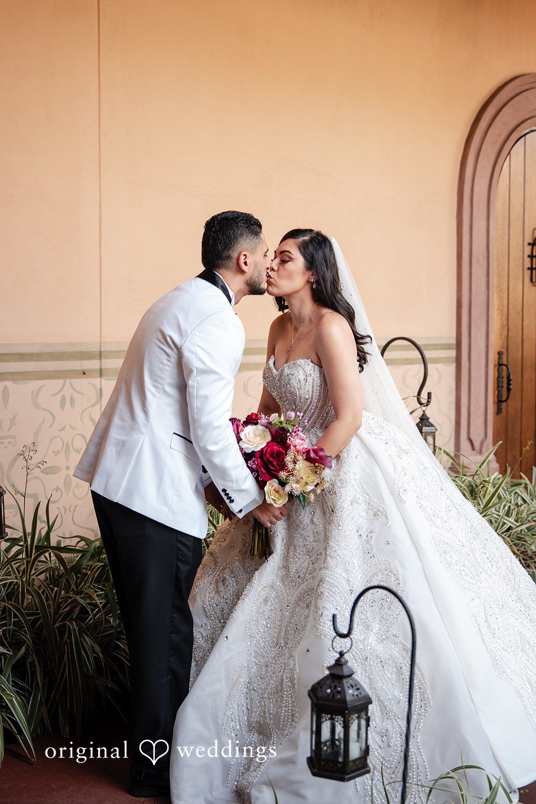 Vanessa + Abdelrahman The couple shares a kiss