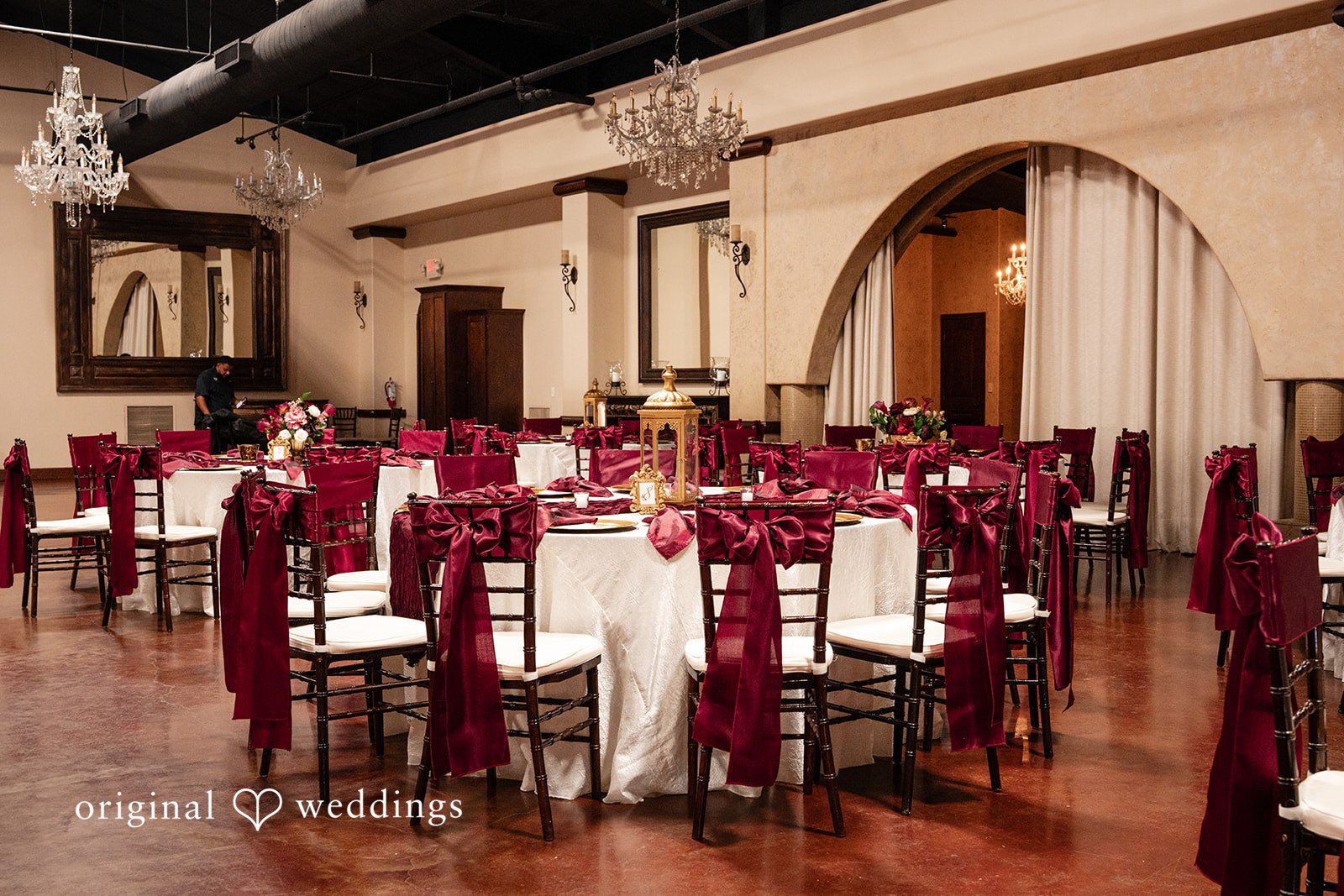 Vanessa + Abdelrahman Neatly decorated tables at the wedding reception
