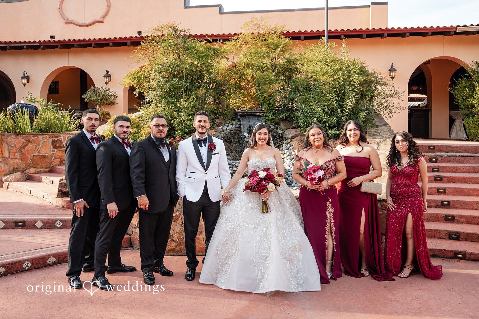 Vanessa + Abdelrahman Our Houston wedding photographers at Original Weddings captured a stunning portrait of the couple and their bridal party at Madera Estates