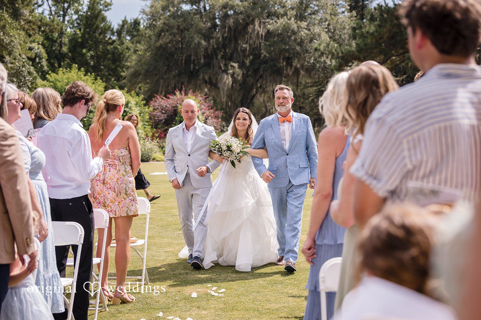 Madison + Aiden Bride walking down the aisle at Magnolia Plantation and Gardens