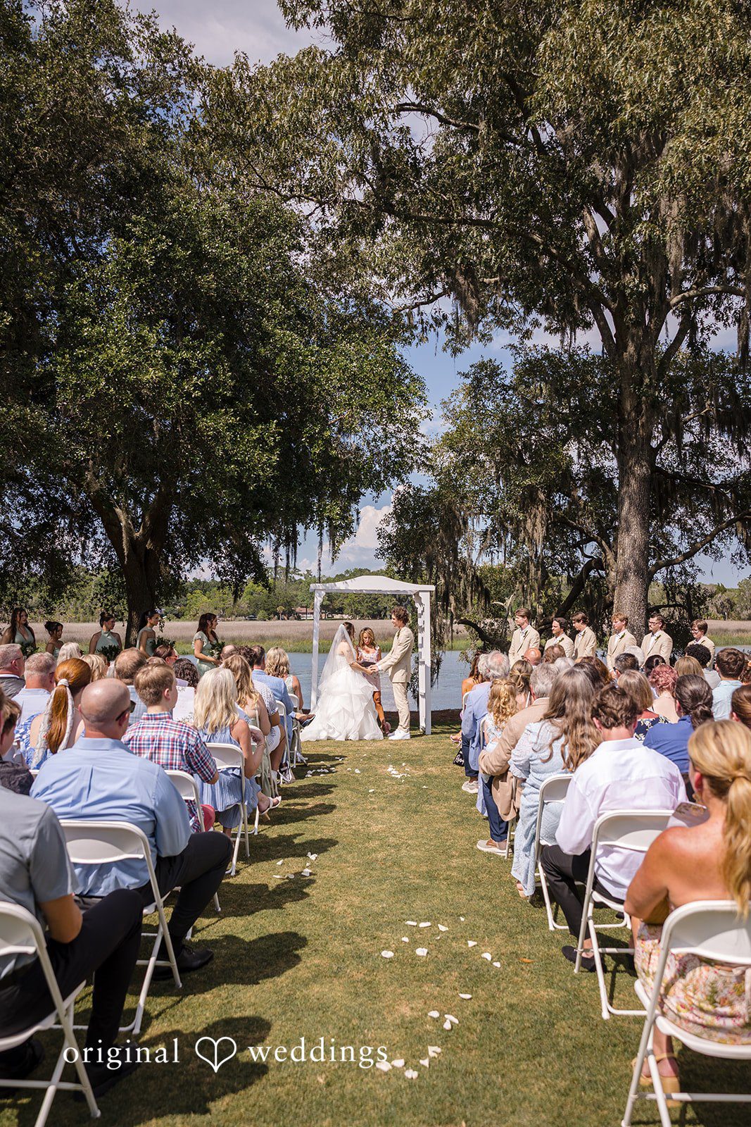 Madison + Aiden Romantic waterfront wedding ceremony at Magnolia Plantation and Gardens