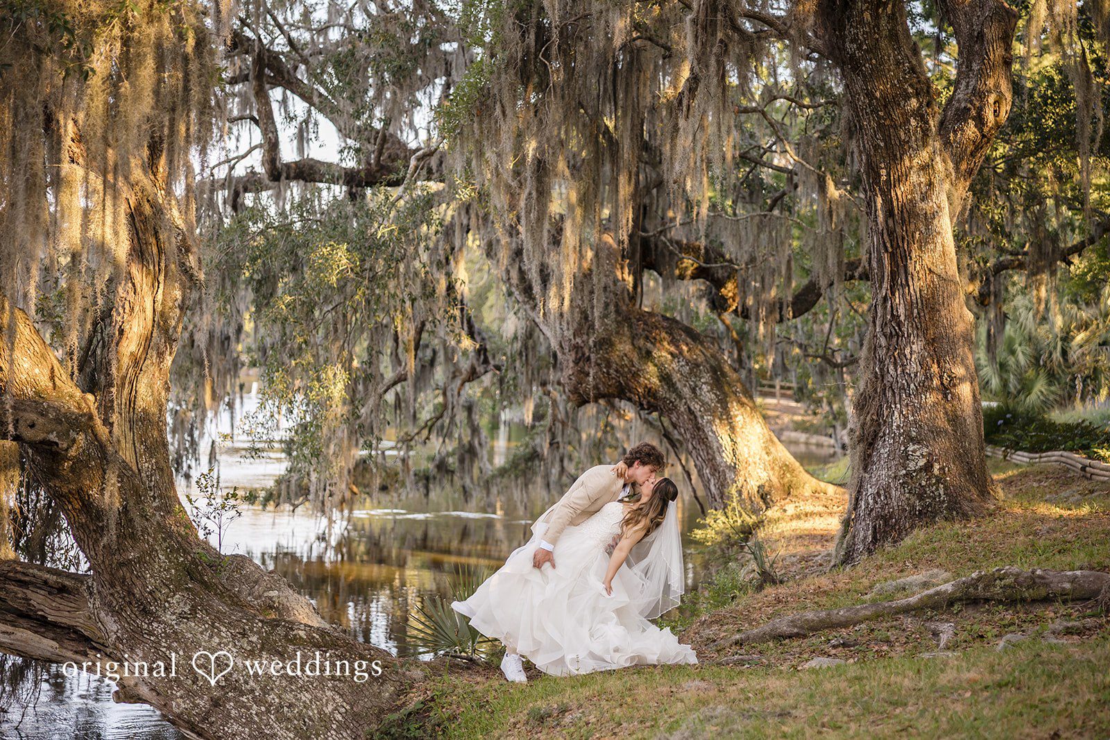 Madison + Aiden Bride and groom sharing a romantic kiss