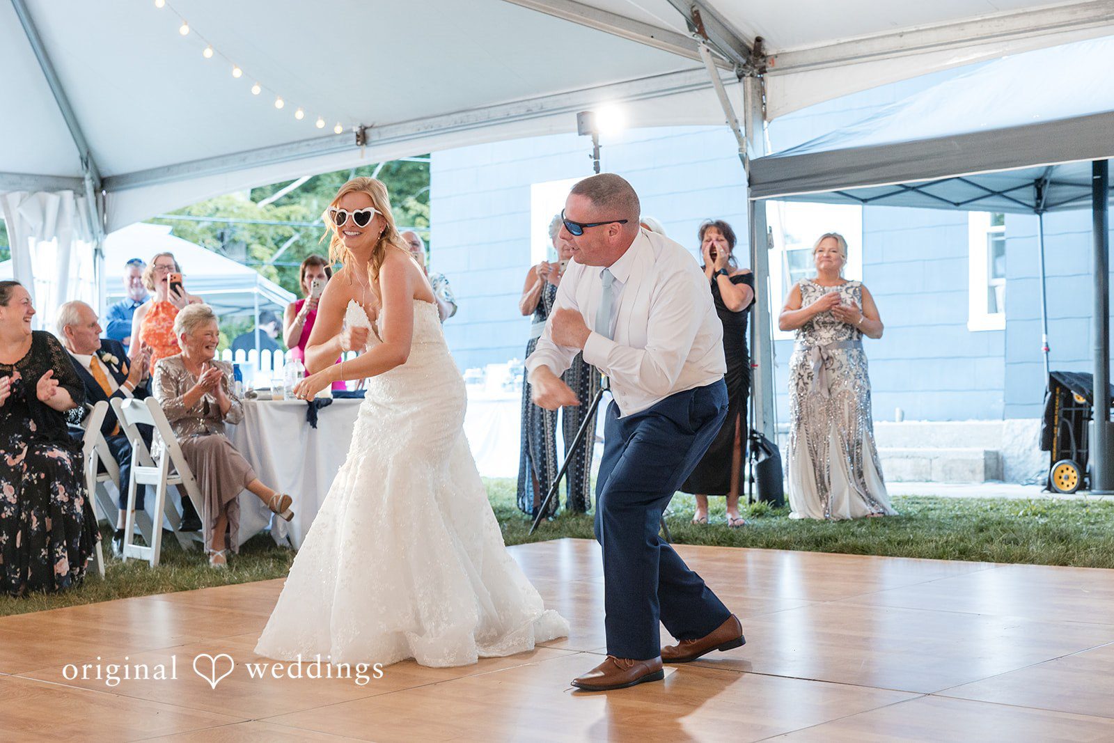 John + Emma Guests laughing and dancing during the wedding reception.