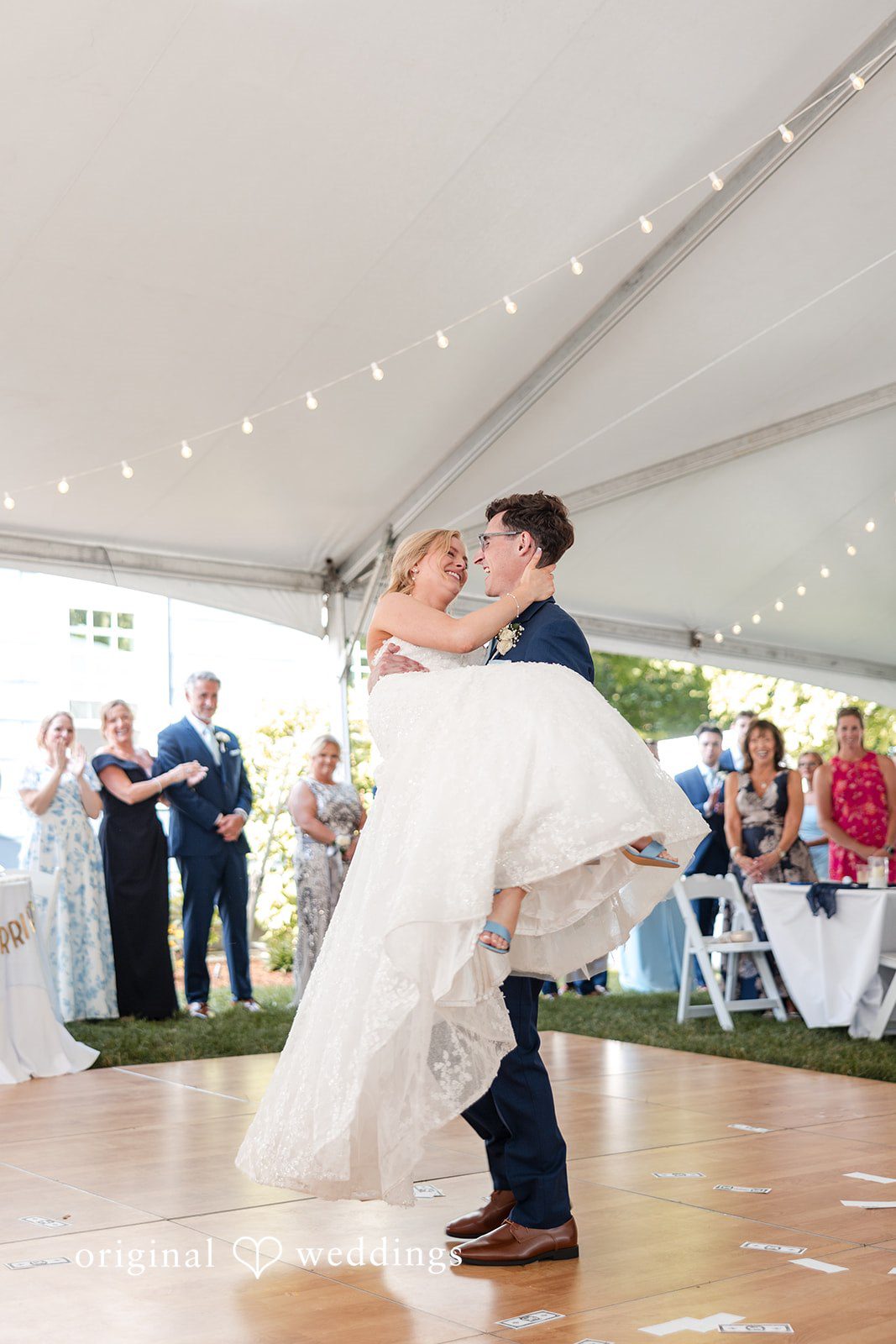 John + Emma Groom dipping the bride during their first dance.