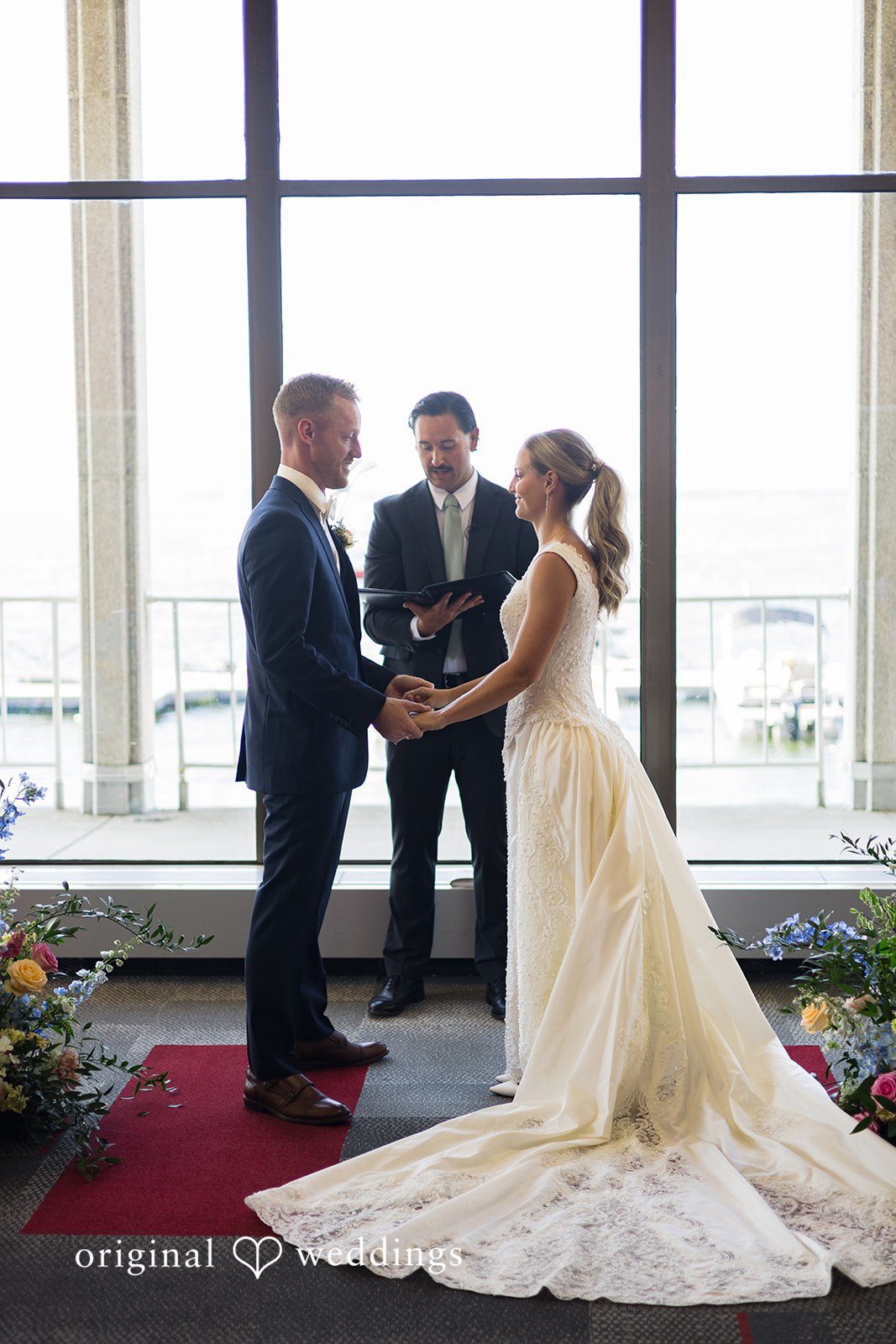 Madison Wedding Photographers documenting an emotional ceremony at Memorial Union for Original Weddings.