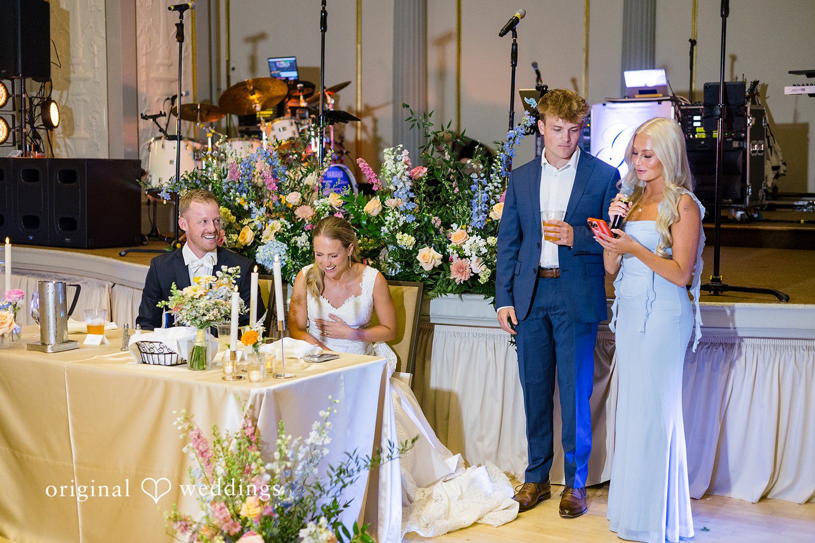 Bride and groom celebrating with family and friends during the reception at Memorial Union.