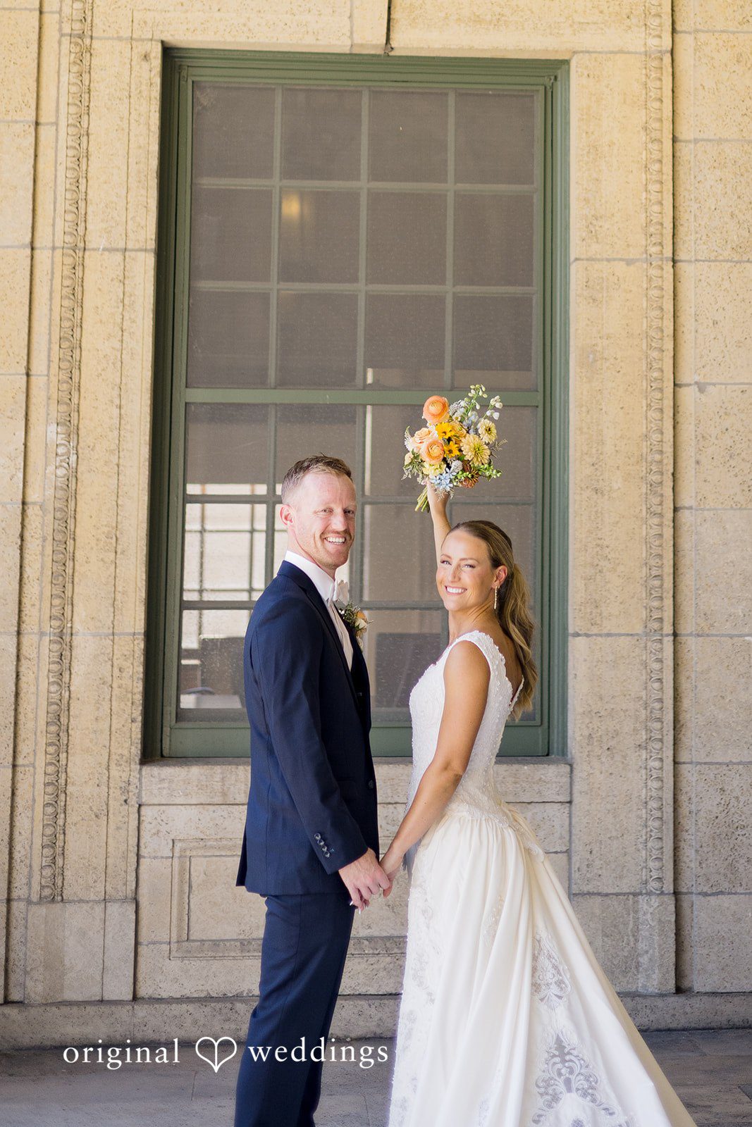 Romantic couple portrait with genuine smiles at Memorial Union.
