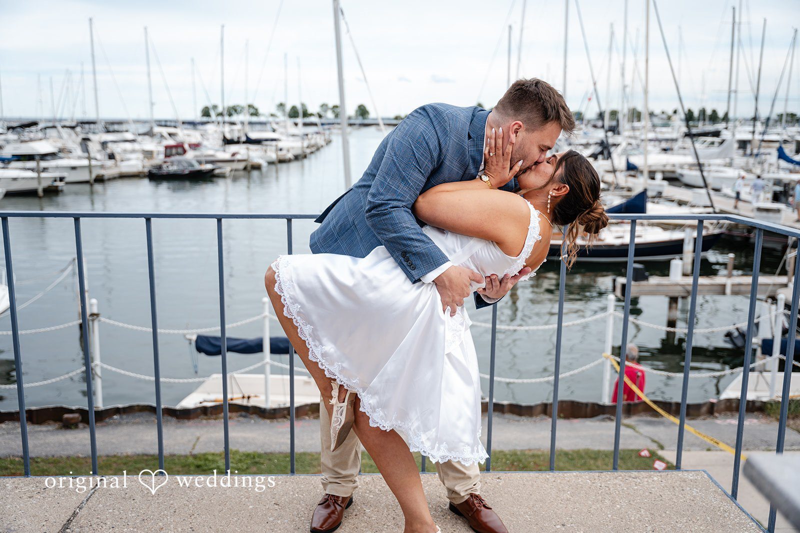 Our Milwaukee wedding photographers at Original Weddings captured a romantic portrait of the couple at the Milwaukee Yacht Club