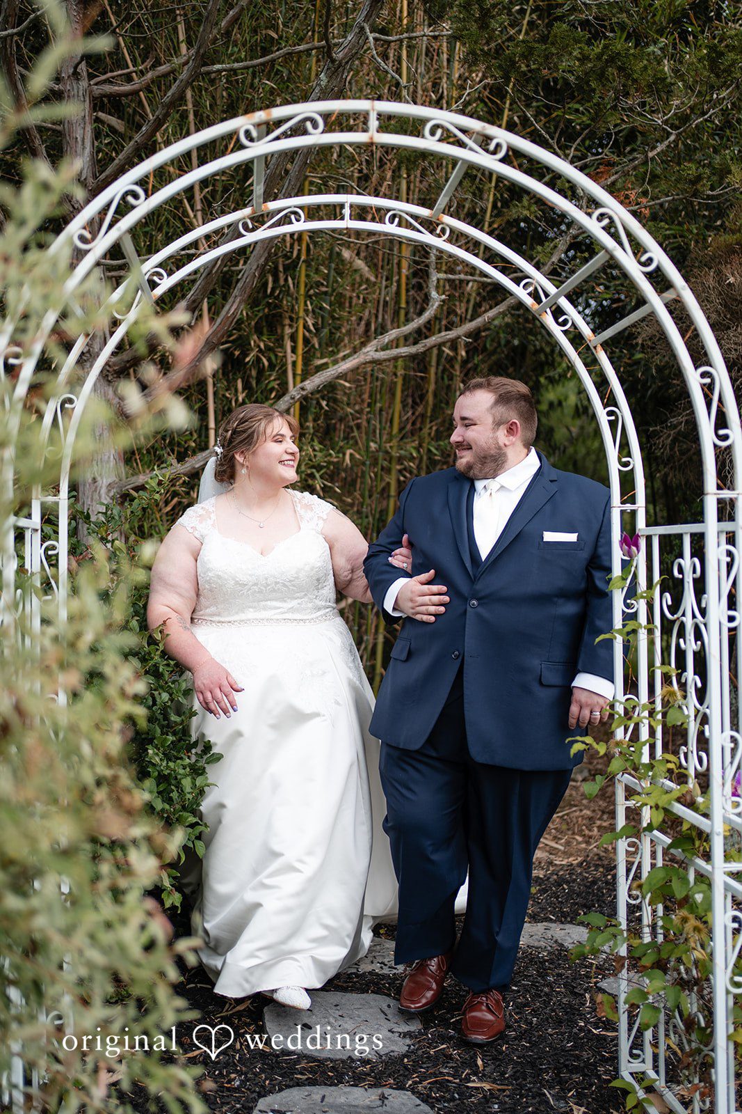 David + Courtney A stunning portrait of the couple by the garden