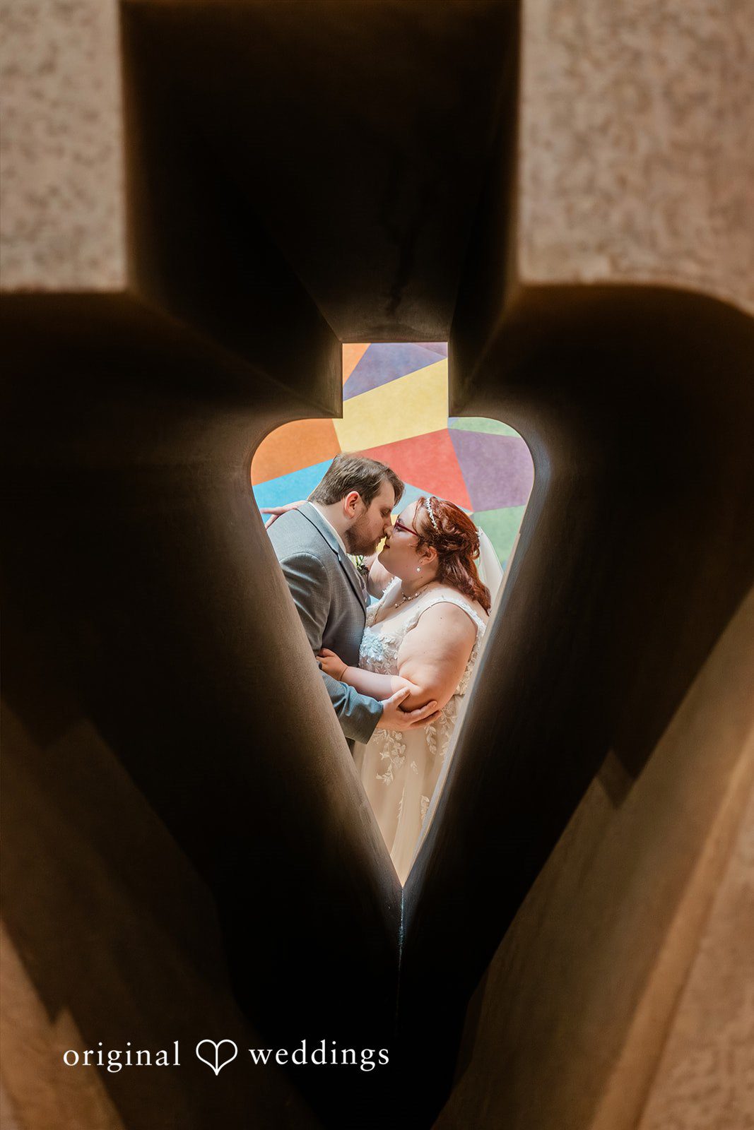 Grace + Nicholas A silhouette cutout framing a romantic portrait of a bride and groom.