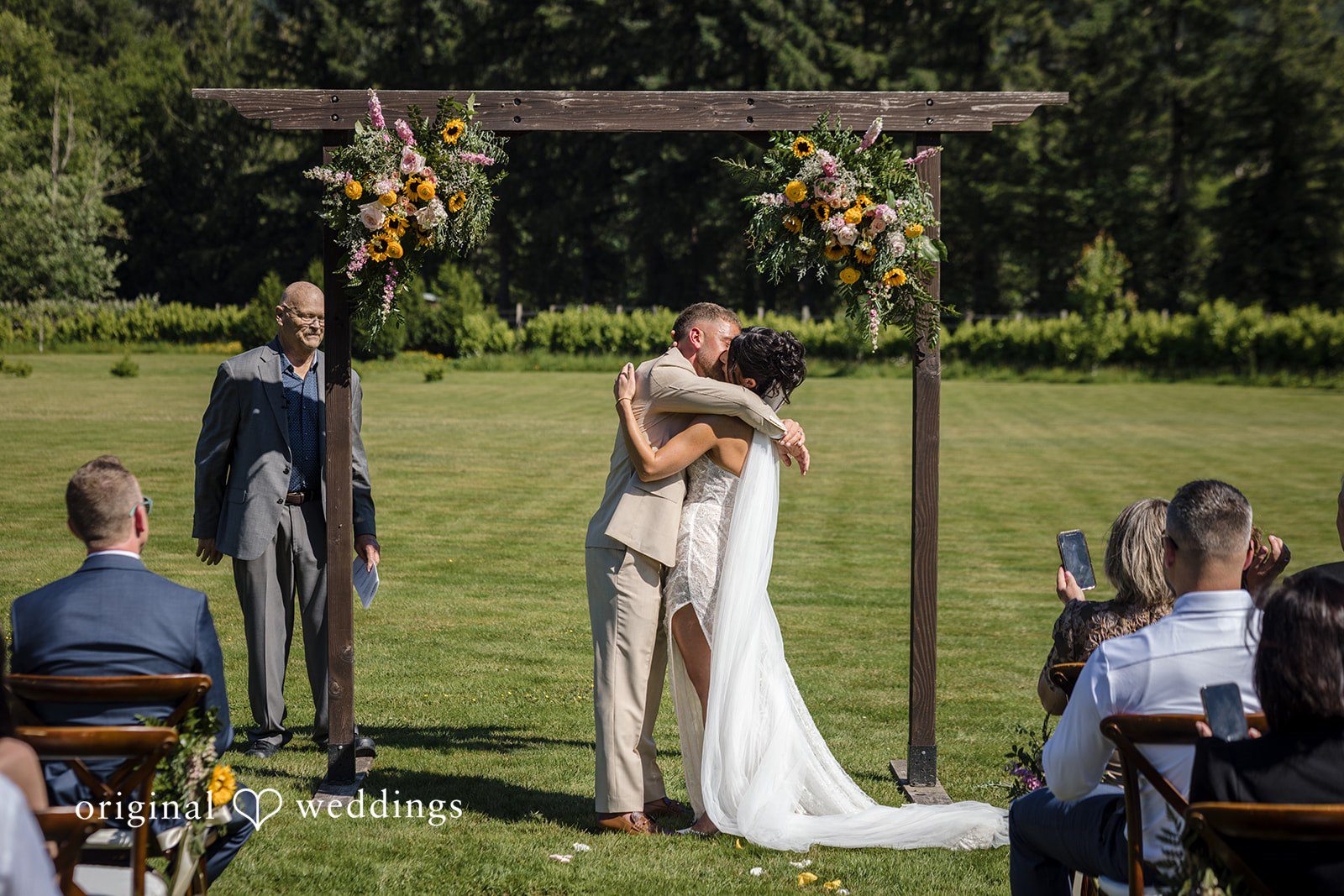 The couple shares a passionate hug