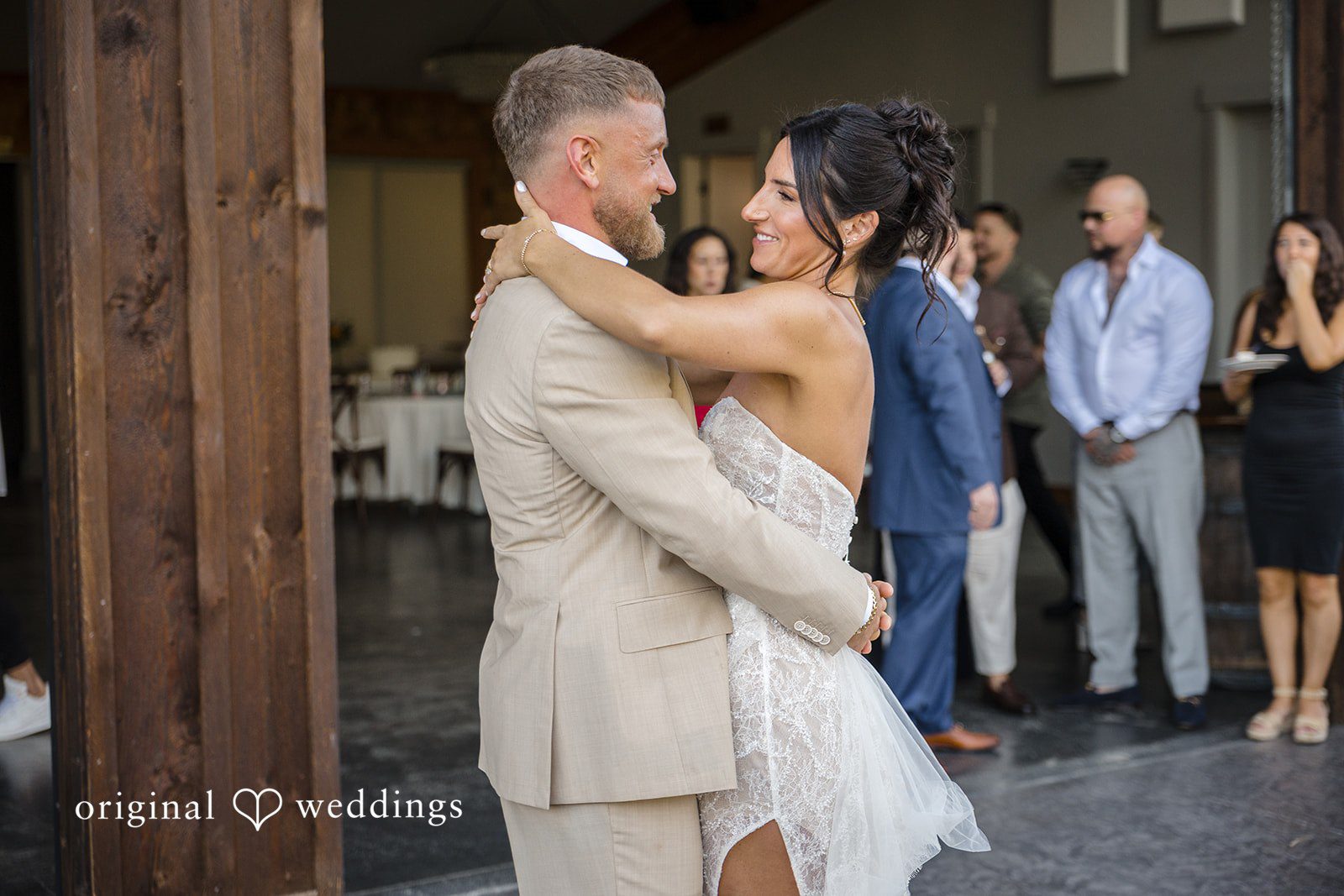 The couple shares a hug