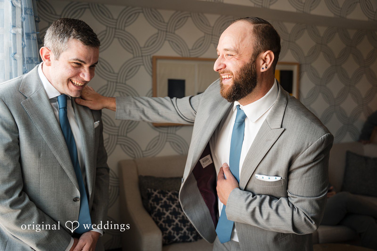 Kerri + David Groom with Groomsmen sharing laughs before the wedding