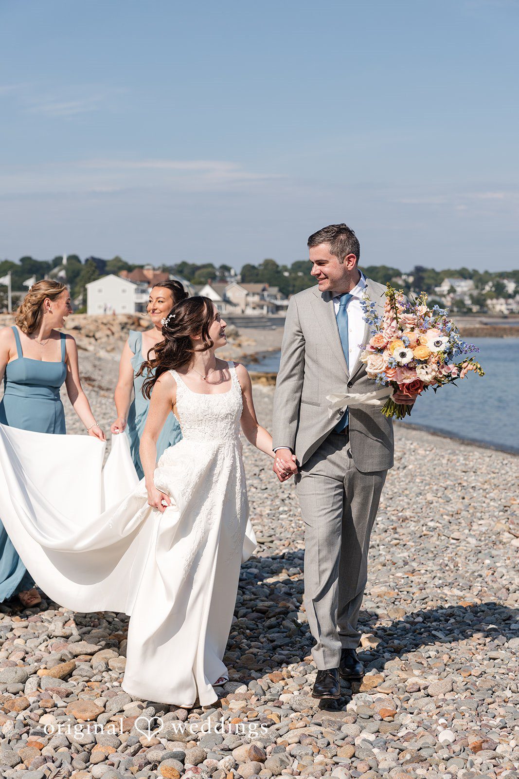 Kerri + David Bride and groom walking hand in hand with bridesmaids at Oceanview of Nahant.
