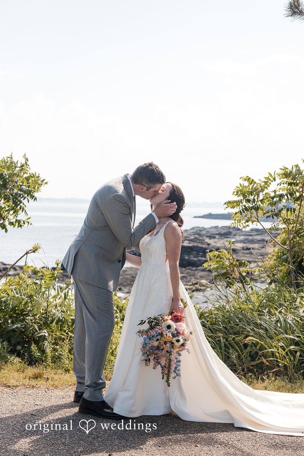 Kerri + David Bride and groom sharing a kiss at Oceanview of Nahant