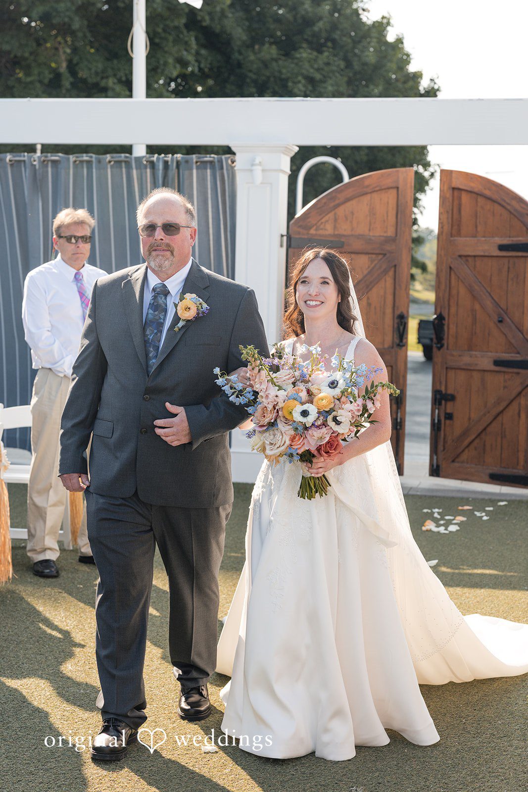 Kerri + David Bride walking into the ceremony at Oceanview of Nahant