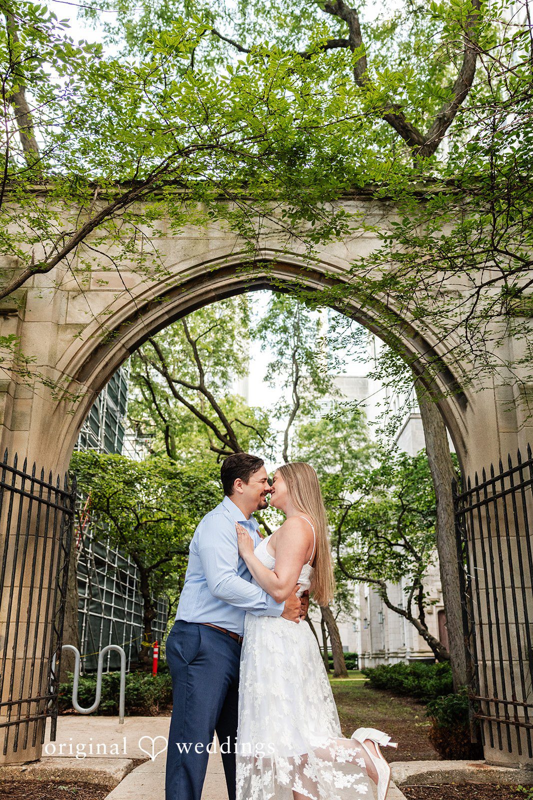 The couple shares a kiss