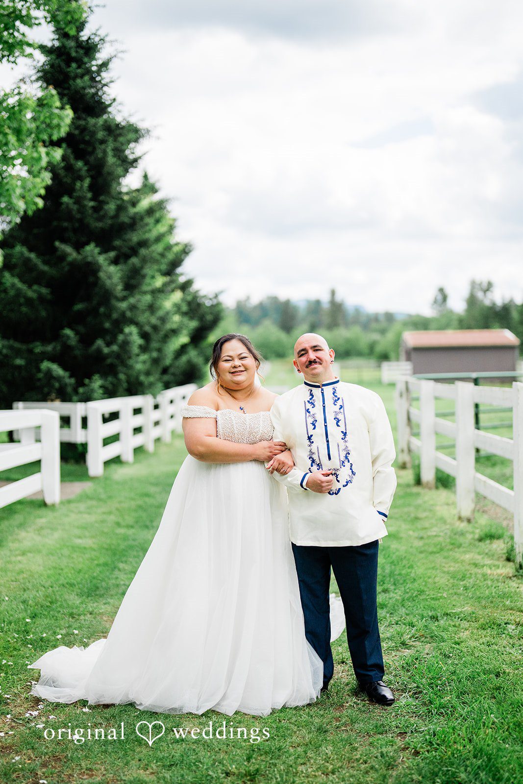 Tiffany Hazel + Ryan Our Seattle wedding photographers captured a stunning portrait of the couple by the greenery