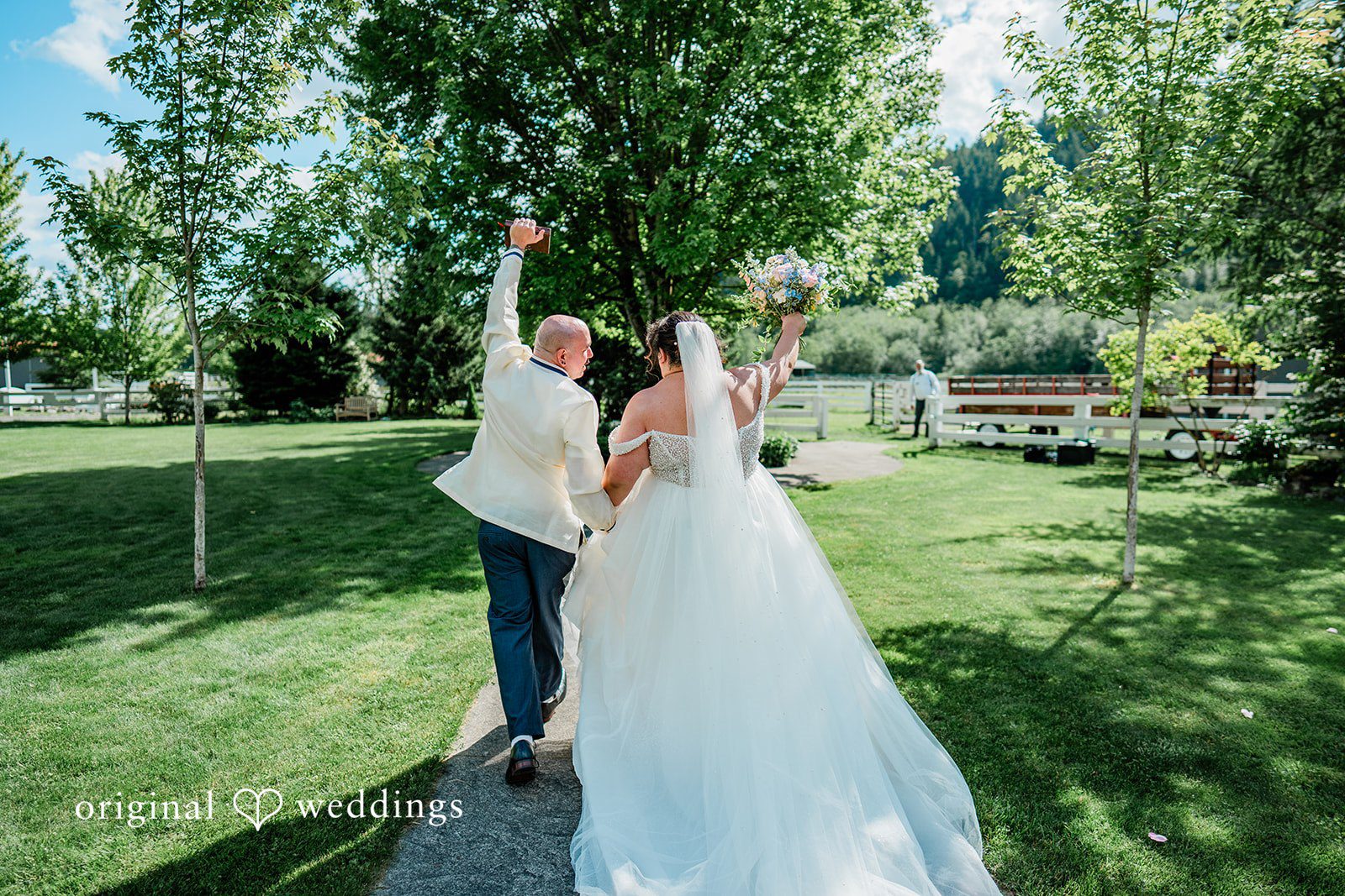 Tiffany Hazel + Ryan The couple joyfully takes a walk after the vows are exchanged