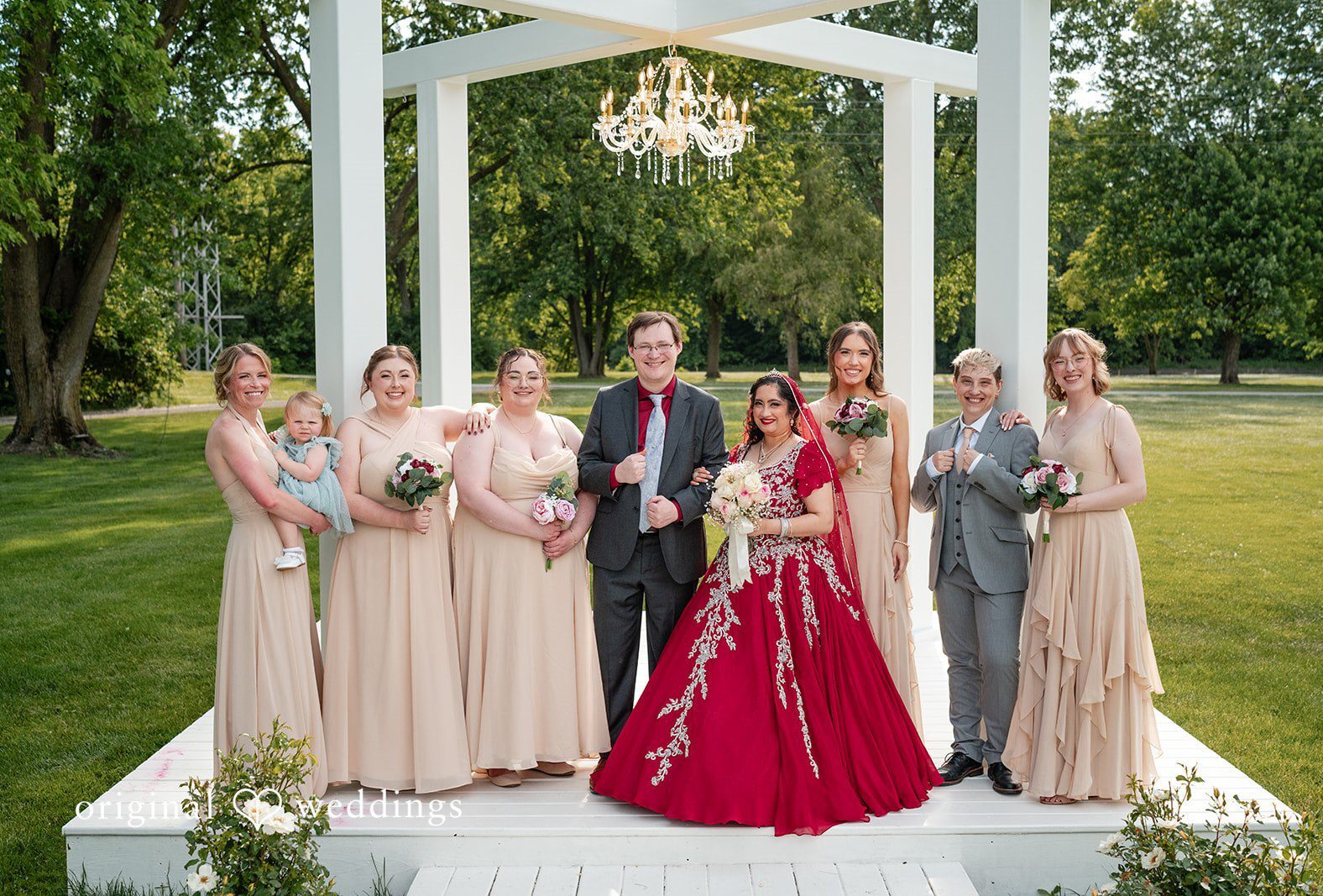 Stunning Portrait of couple with guests at Revelry 675 by Chicago Wedding Photographers from Original Weddings.