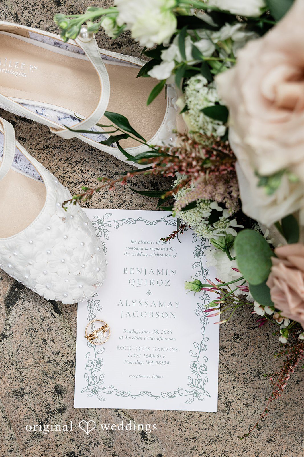 AlyssaMay + Benjamin Close up shot of bridal accessories and wedding invitation card