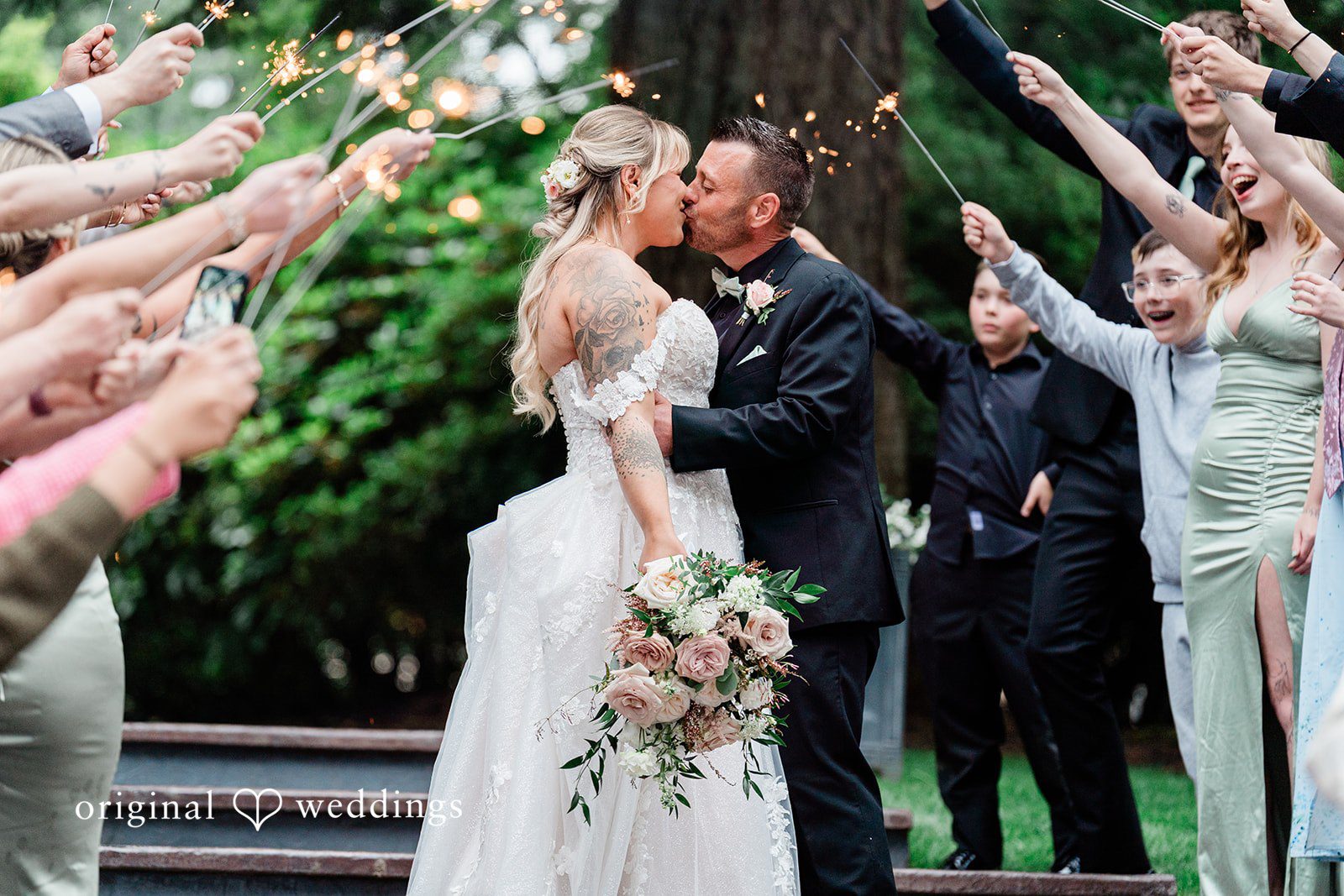 AlyssaMay + Benjamin Bride and groom sharing a romantic kiss at Rock Creek Gardens