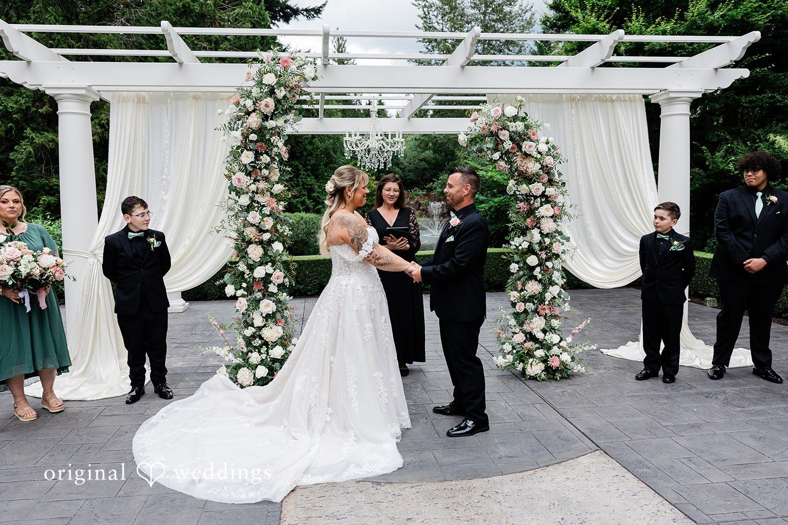 AlyssaMay + Benjamin Bride and groom exchanging vows during wedding ceremony
