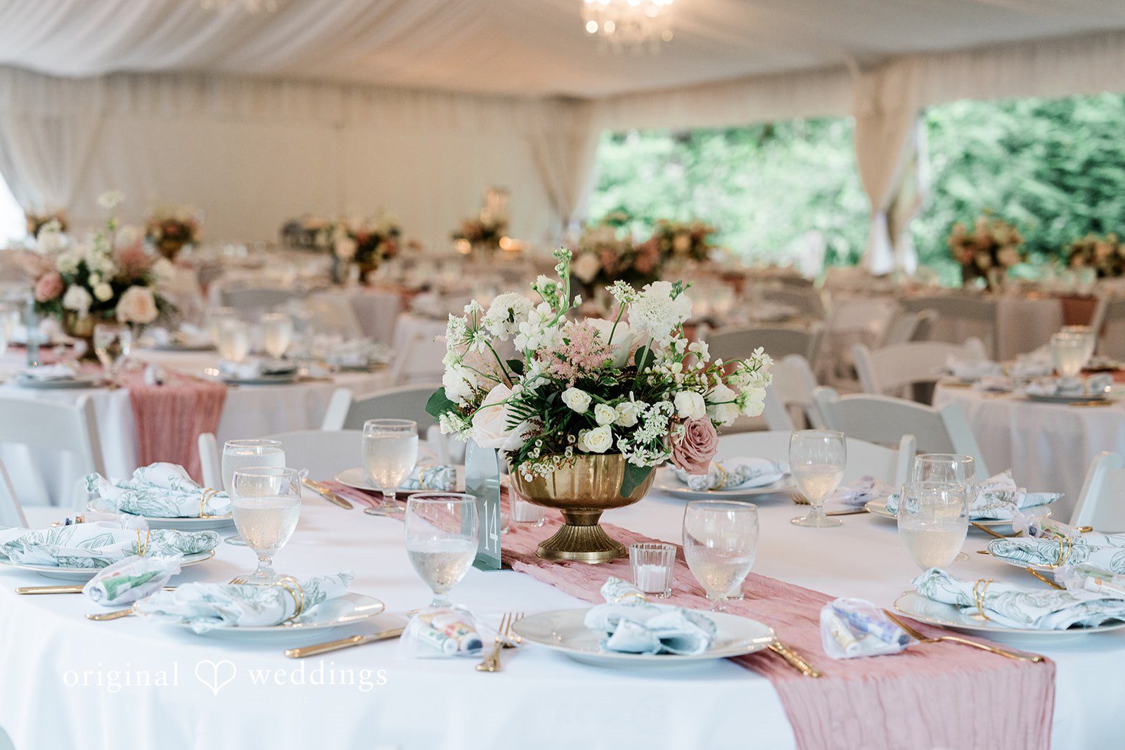 AlyssaMay + Benjamin Close of wedding table decorated with flowers