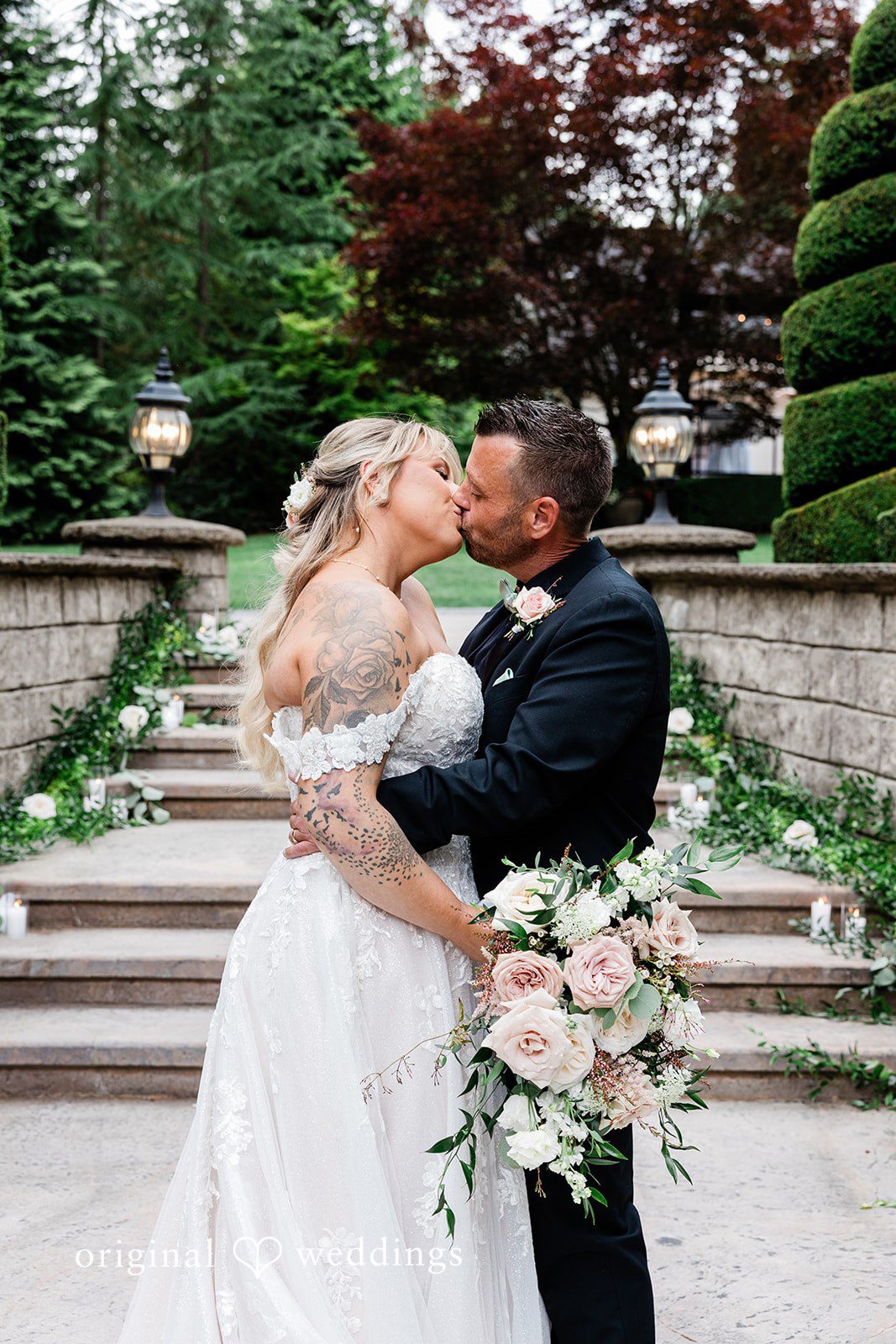 AlyssaMay + Benjamin Bride and groom sharing a romantic kiss